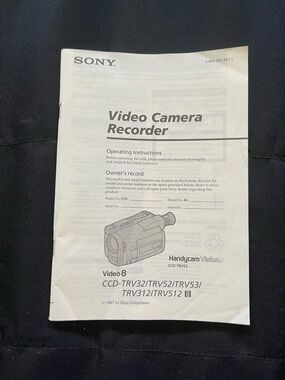Sony White Video Camera Recorder Manual with Black Illustration